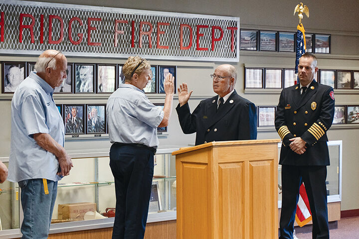 The new High Ridge fire marshal, Jason Schaub, is sworn in.